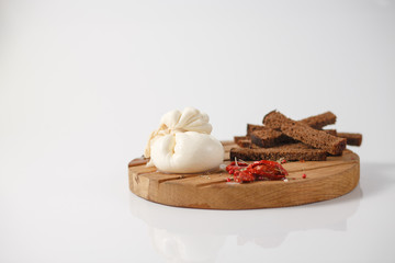 traditional Italian food, burrata cheese on a white background