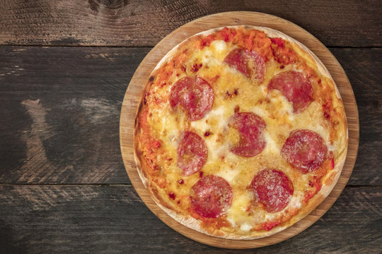 Pepperoni pizza with place for text, overhead shot