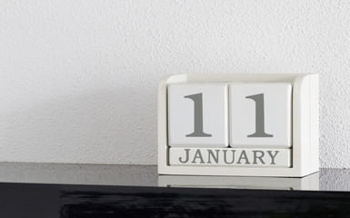 White block calendar present date 11 and month January