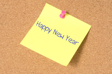 Eine Notiz mit dem Slogan Happy New Year