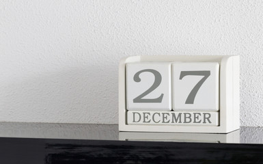 White block calendar present date 27 and month December
