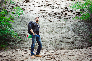 Man Traveler with backpack mountaineering Travel Lifestyle concept