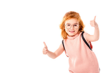 red hair kid with backpack showing thumbs up isolated on white