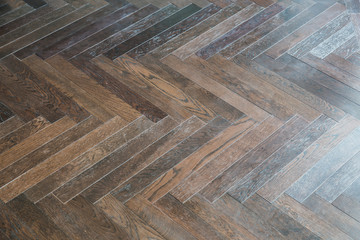 Herringbone Pattern, zigzag wood floor pattern background with light from window close up detail