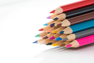 Stacked wooden coloured pencils
