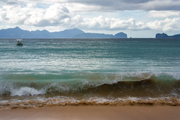 Las Cabanas beach stormy weather in Palawan island, Philippines