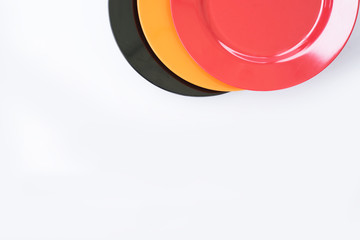 Melamine Black/Red/Orange Plate stack On a white background