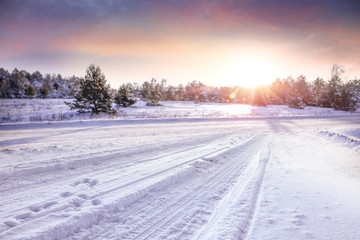 Fototapeta na wymiar Winter road background and free space for your decoration 