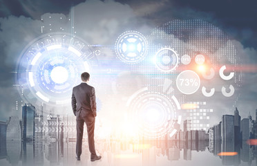 Businessman looking at a city, HUD