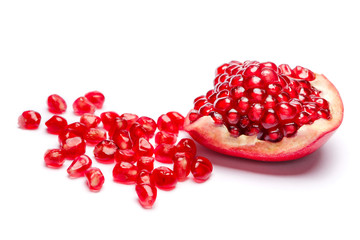 Pomegranate and seeds close-up