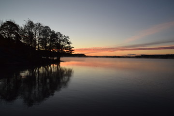 Fototapeta na wymiar Sunrise over a frozen lake