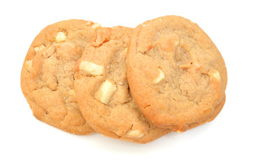 Small stack of macadamia nut and white chocolate cookies. 