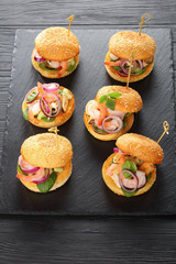 seafood burgers pinned with bamboo skewers