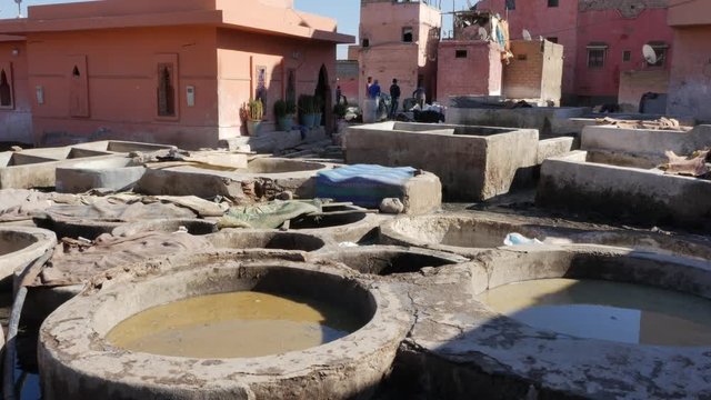 Traditional leather tannery in medina of Marrakesh in Morocco – 4K