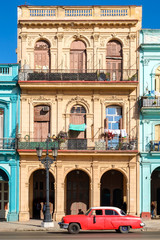 Fototapeta na wymiar Urban scene with colorful buildings in Old Havana