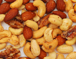 Mix of nuts close up on background