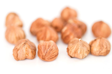Hazelnuts isolated on white background