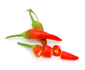 Heap of green Chili peppers isolated on white background