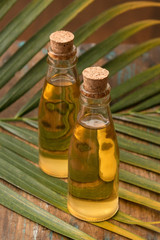 Oil in glass bottle with cork lid