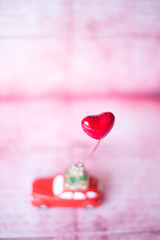 red heart and  miniature car