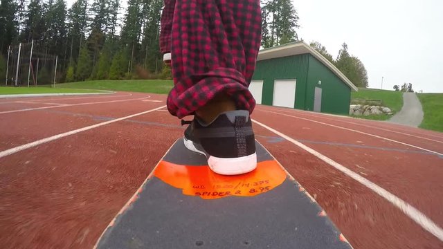 Action camera POV of skater riding board