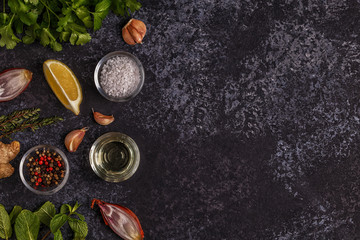 Background with spices, herbs and olive oil.