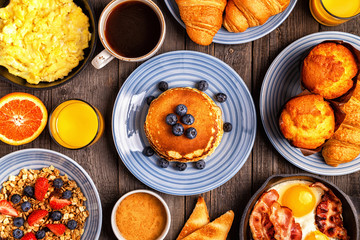 Delicious breakfast on a rustic table.