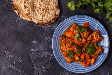Traditional Indian curry with vegetables.