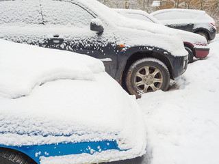 Car under the snow.
