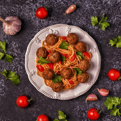 Roasted  meatballs with spaghetti.
