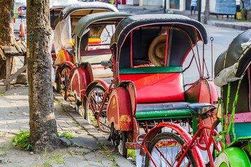 Bevak, rickshaw or pedicab in Indonesia - obrazy, fototapety, plakaty