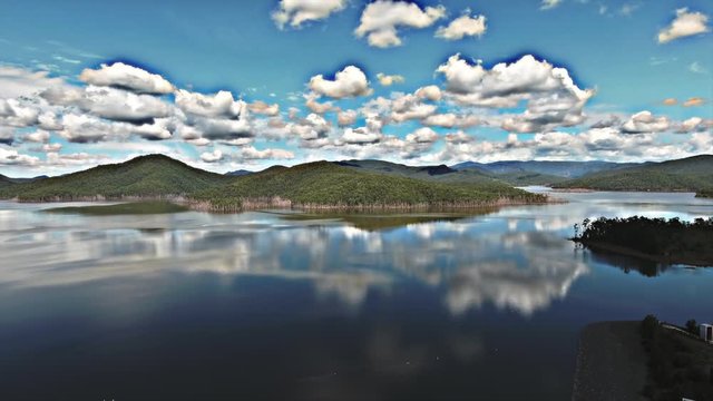 reflections of dramatic clouds in hinterland
