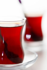 Turkish tea in traditional glass isolated on white background