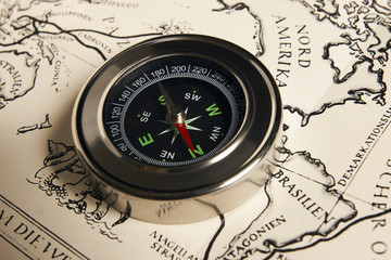 Magnetic compass with vintage map