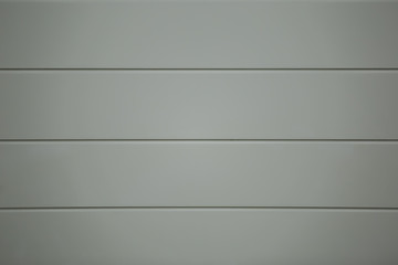 Gray vinyl wooden siding panel background texture