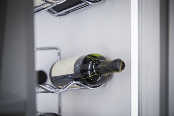 A wine cooler with a bottle