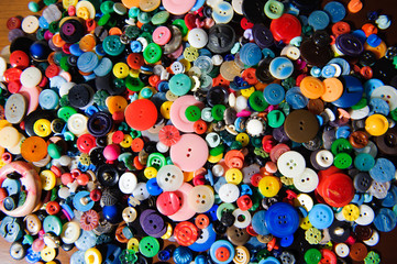 Sewing buttons background. Colorful sewing buttons texture