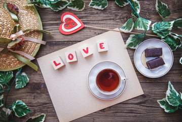 Festive layout for Valentine day on wooden background with heart