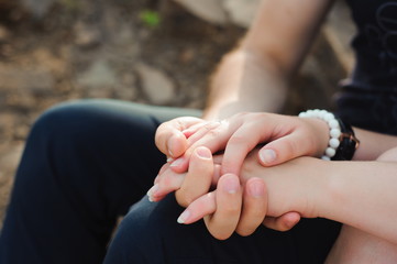 Love, romance and people concept - happy young couple hugging