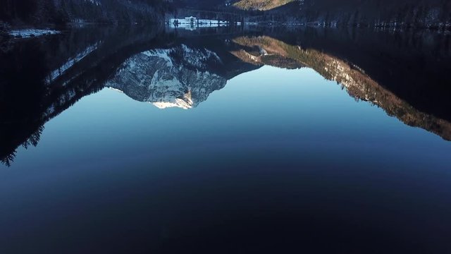 aerial flight over winter landscape in ebensee