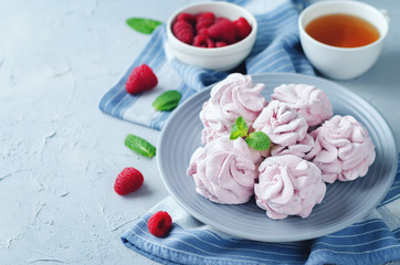 Raspberry Zephyr on a plate with fresh raspberries and mint