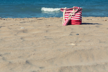 Beach tote on a sandy beach in summer