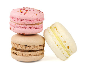 Three multicolored macaroons on a white background. Isolated.