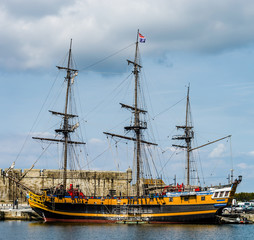 Old pirate frigate and boats in St-Malo