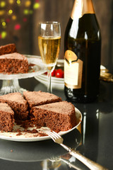 chocolate cake with champagne beside