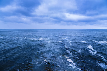 Seascape view on blue water