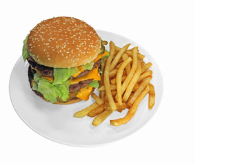 Triple Cheeseburger With Fries copy space on right, isolated on plain white plate. Lettuce, cheese, bun, delicious hamburger
