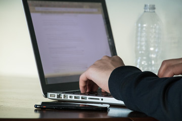 Young business man multitasking