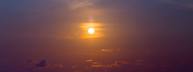 Sunrise Sun purple and pink sky with reflection in water, colorful clouds wallpaper