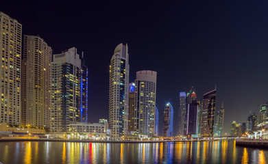 Obraz na płótnie Canvas Modern buildings in Dubai, skyscrapers architecture desert locations UAE.